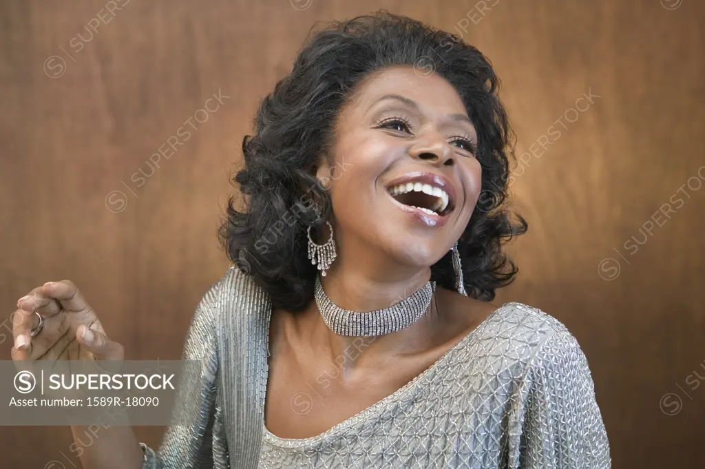 Close up of African American woman laughing