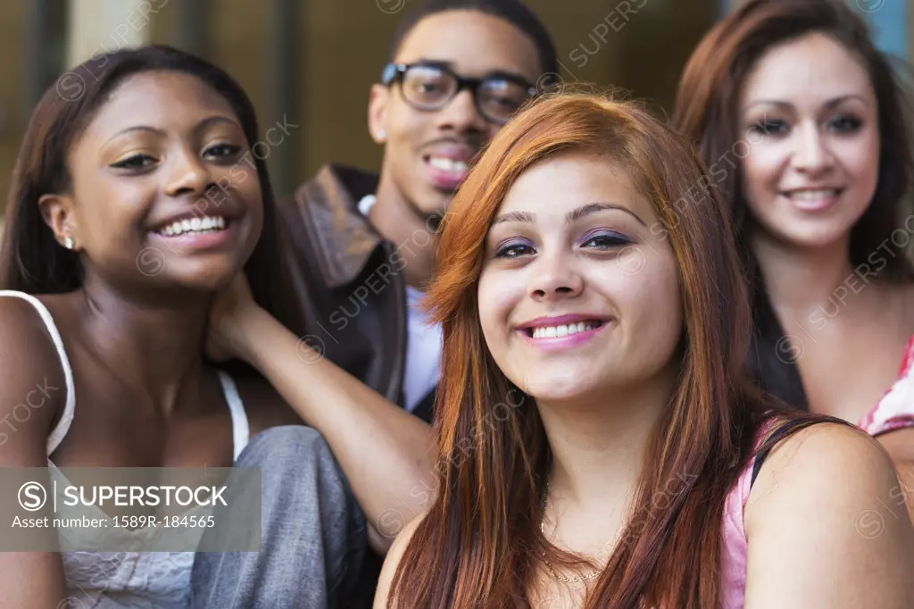 Teenagers smiling outdoors