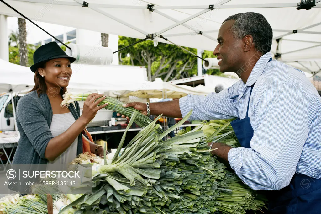 Black woman shopping at outdoor market
