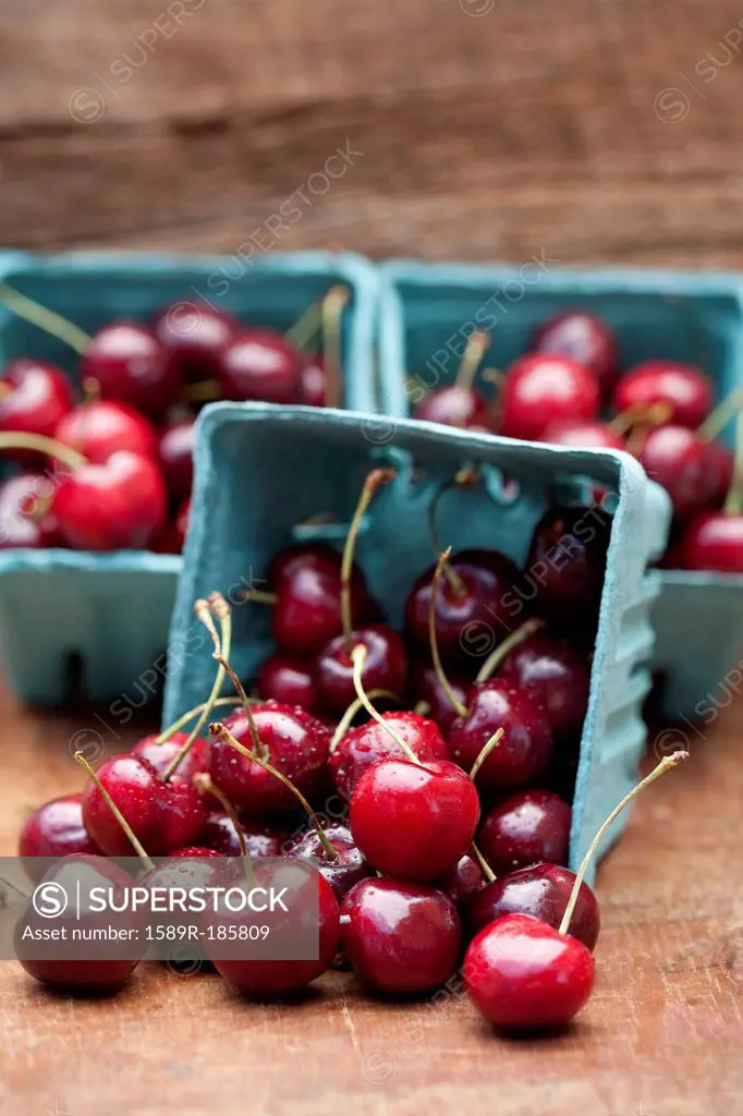 Close up of bing cherries in cartons