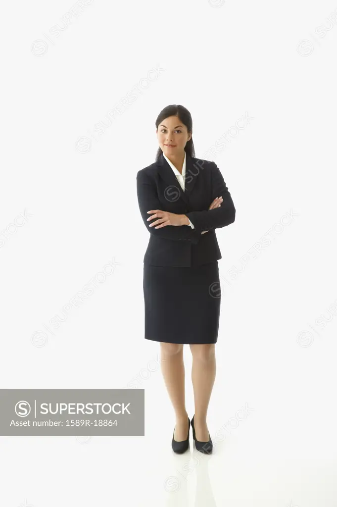 Businesswoman posing for the camera with arms crossed