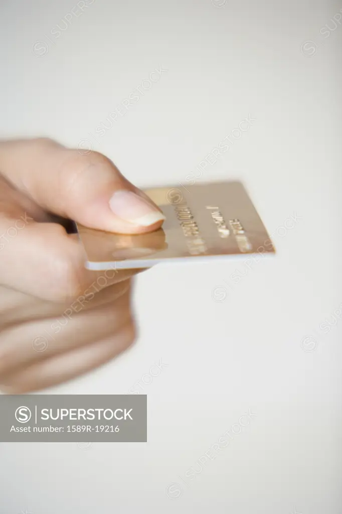 Woman paying with a credit card