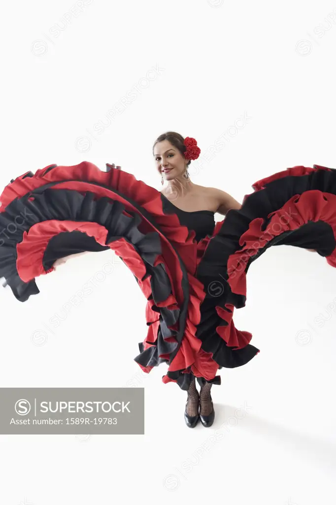 Salsa dancer twirling her skirts