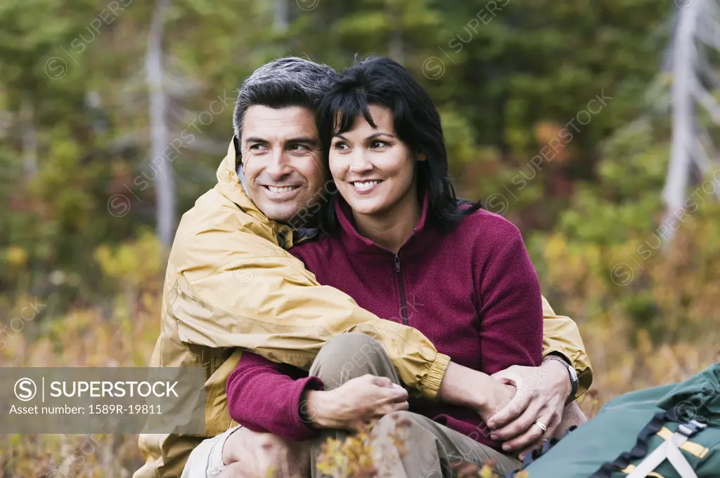 Couple smiling together outdoors