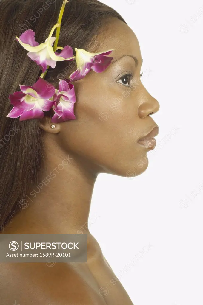 Young woman wearing flowers on her head