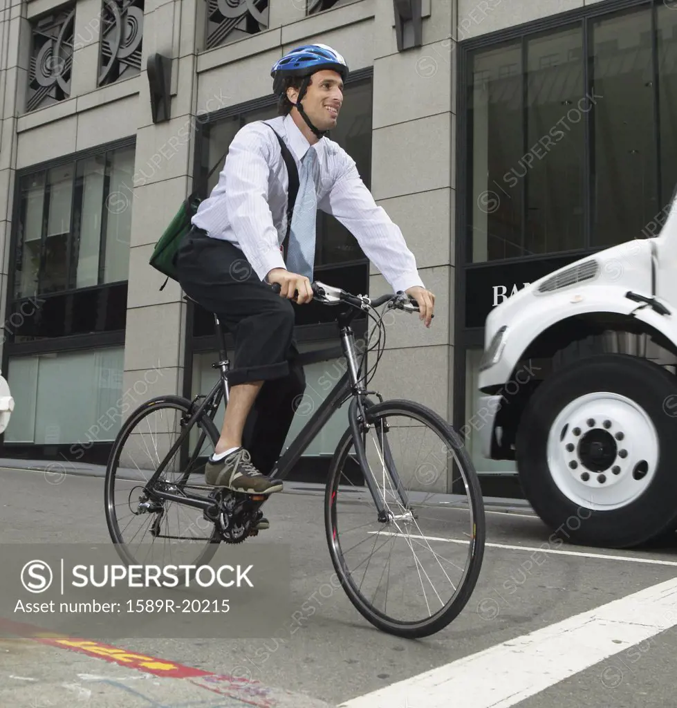 Businessman commuting on bike