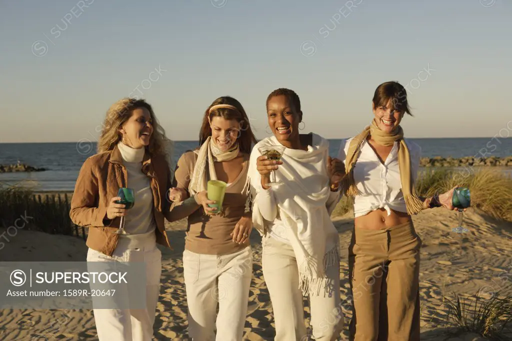 Women walking on the beach together