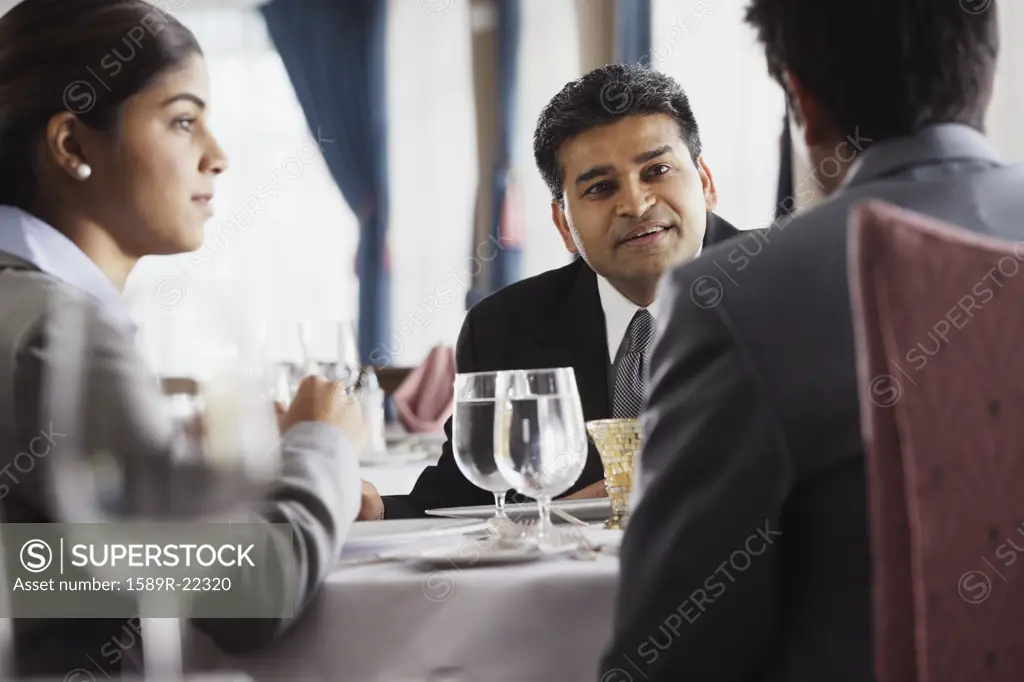 Businesspeople having a meeting at a restaurant