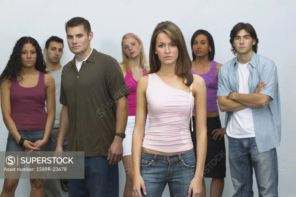 Group of young people looking serious