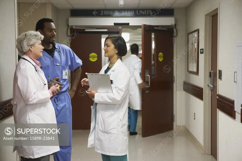 Hospital staff talking in the hallway, Bethesda, Maryland, United States