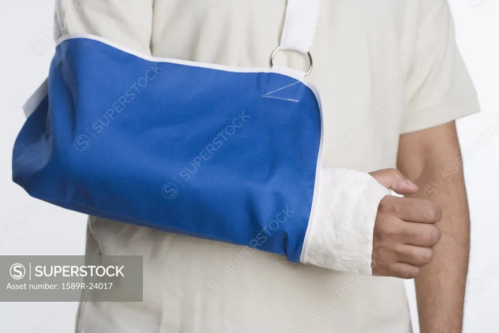 Close up of man's arm in sling