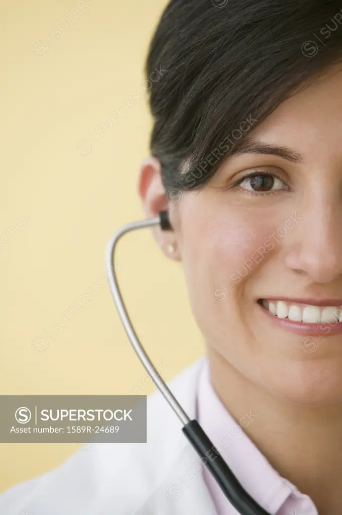 Hispanic female doctor with stethoscope