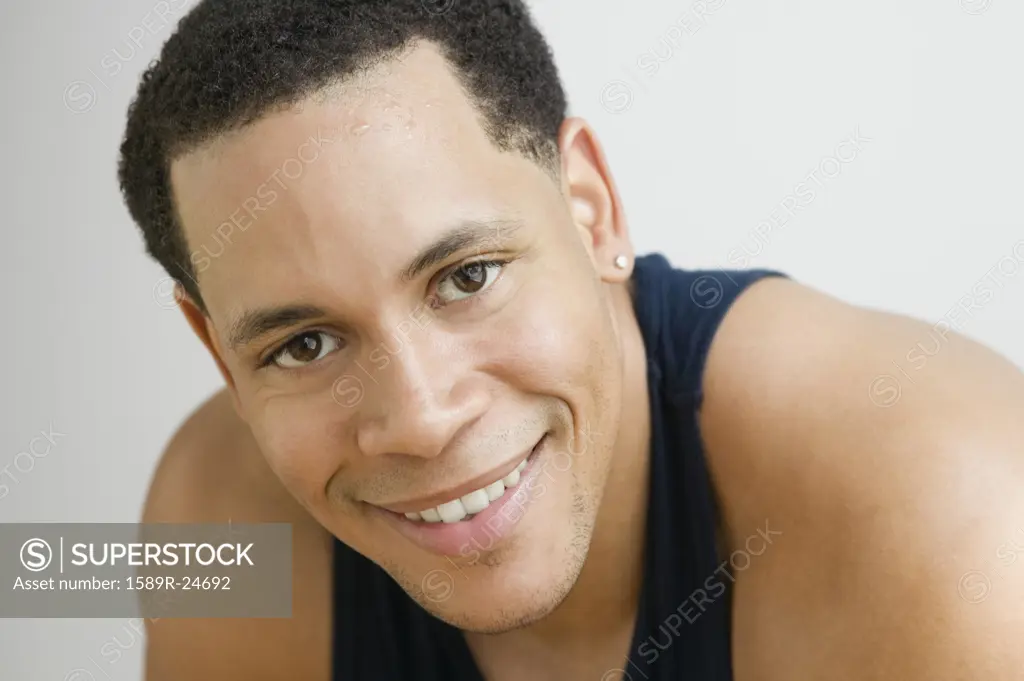 Studio shot of African American man smiling