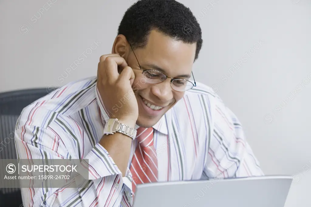 African American businessman with laptop