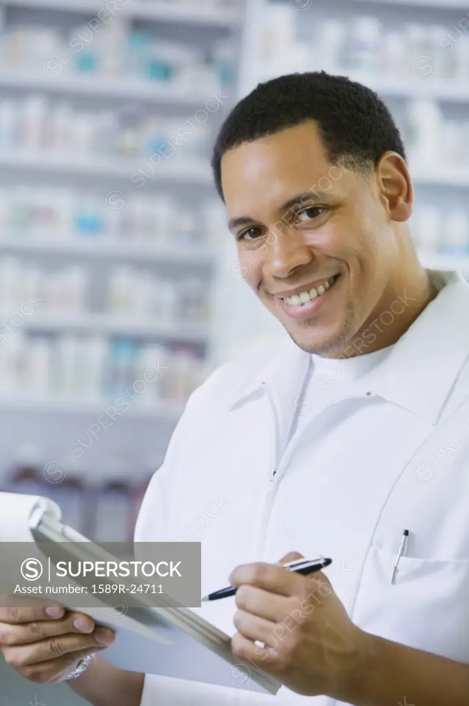 African American male pharmacist smiling