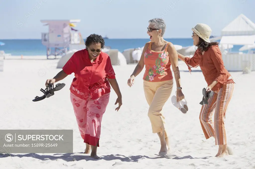 Group of middle-aged women at the beach, Miami, Florida, United States