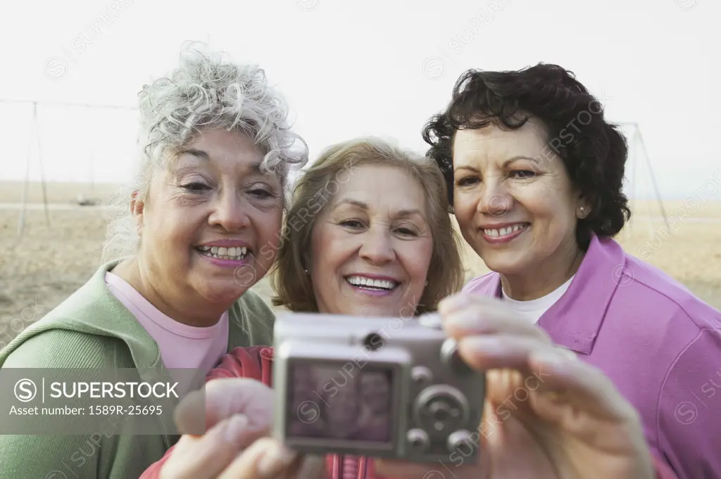 Group of senior women taking a photograph of themselves