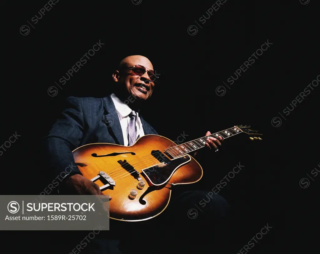 African American man with guitar
