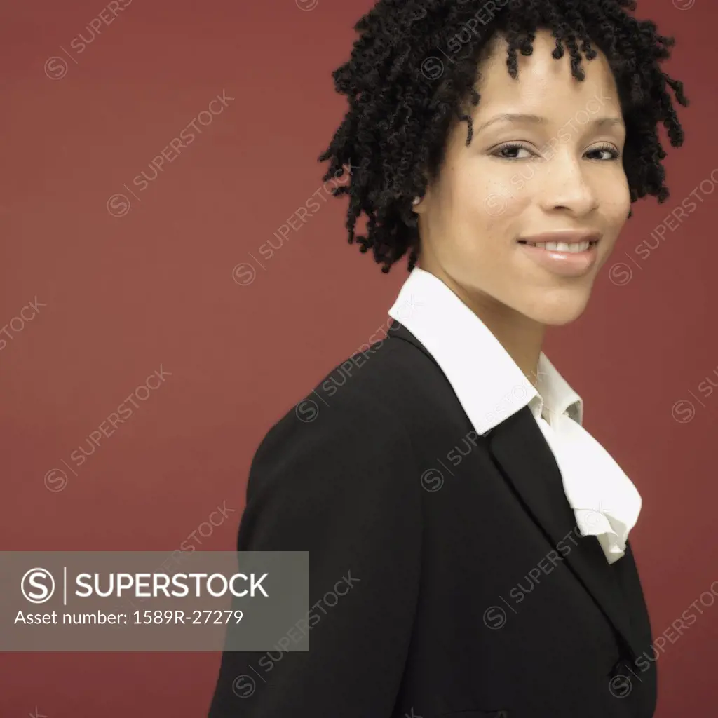 Studio shot of African businesswoman smiling