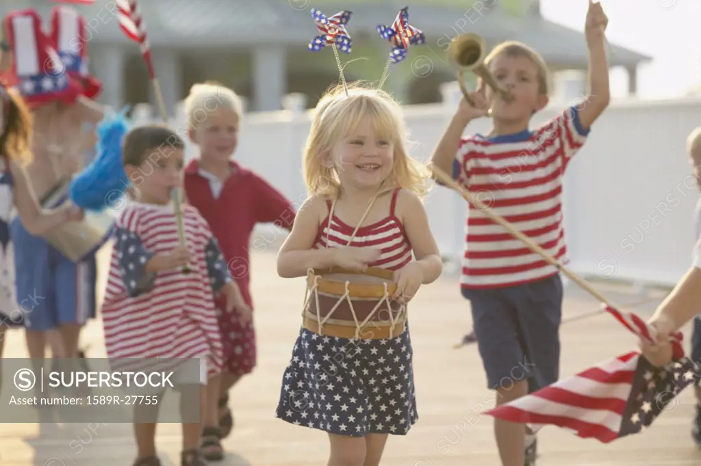 Young children walking in Fourth of July parade