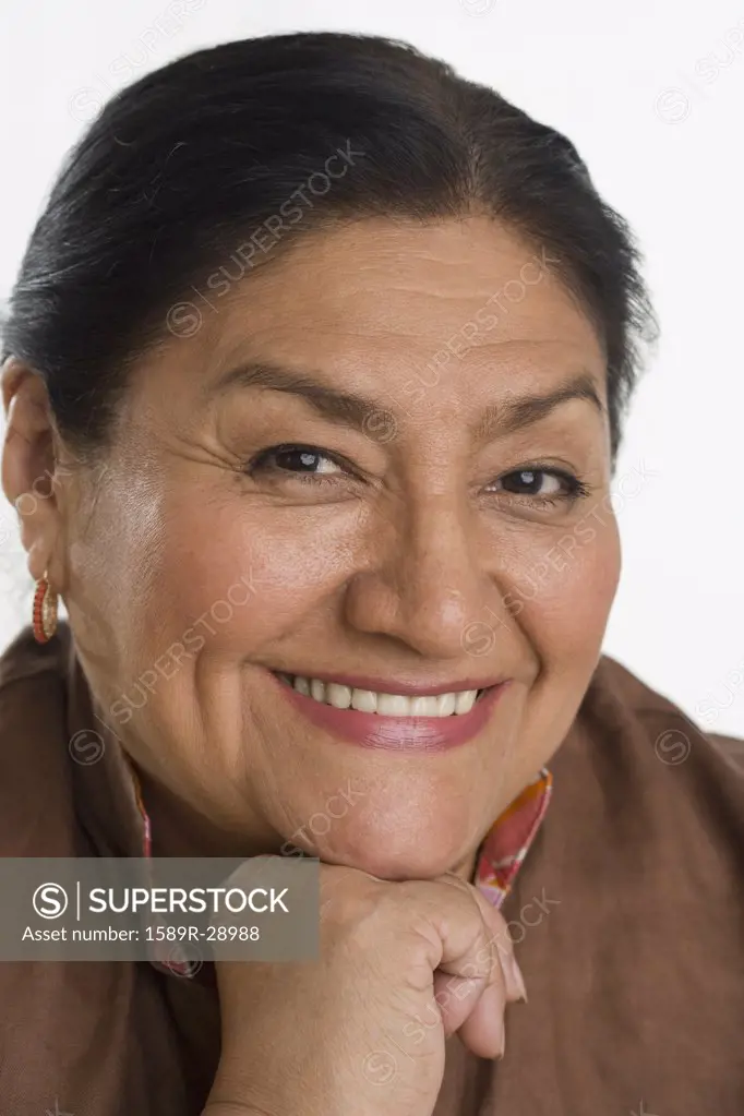 Close up of senior Hispanic woman smiling