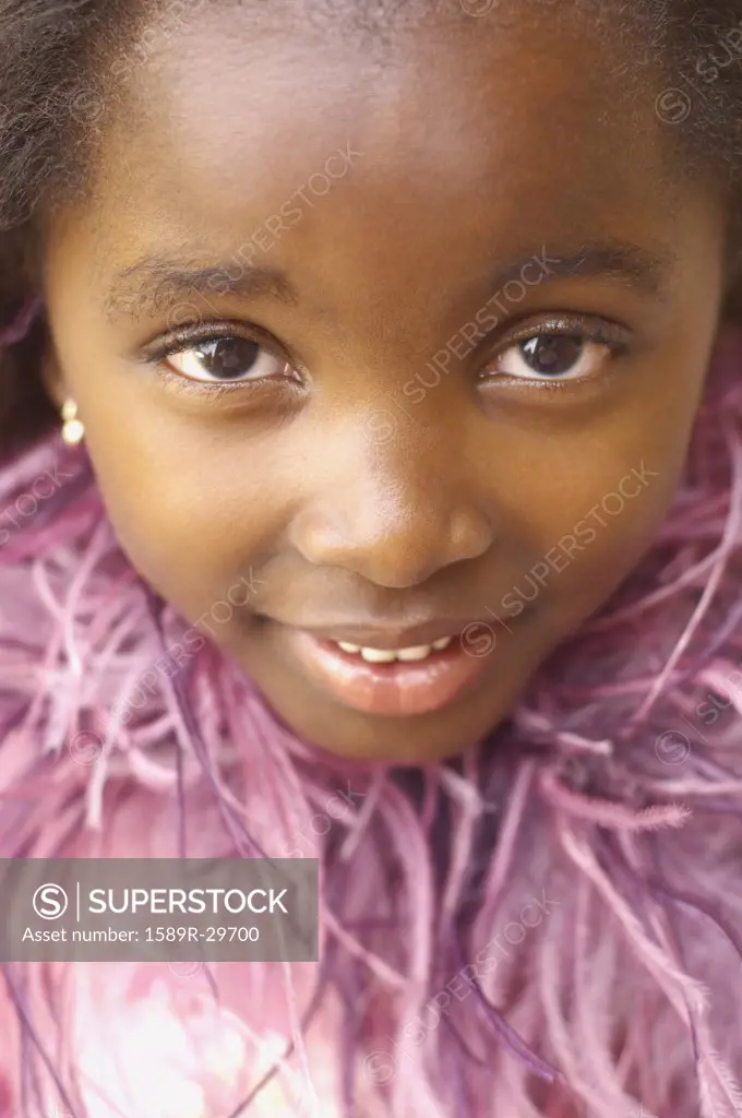 Close up of young African girl smiling