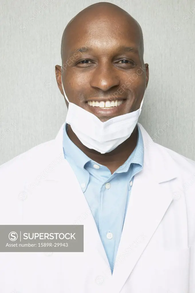 African male dentist smiling