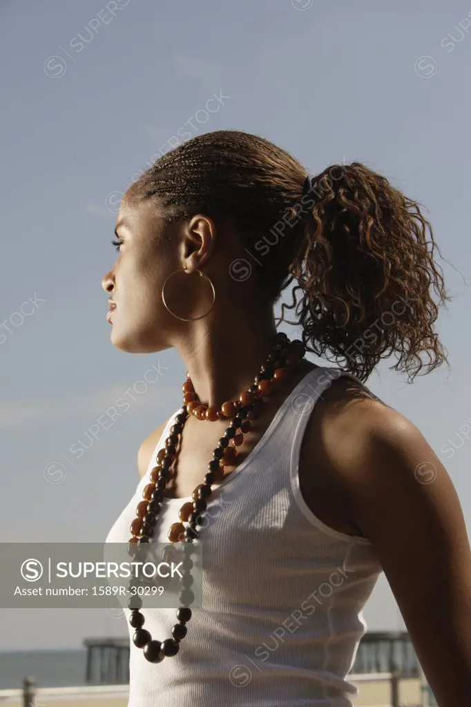 Young African woman at beach