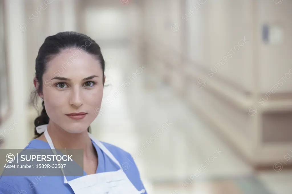 Female doctor in hospital corridor