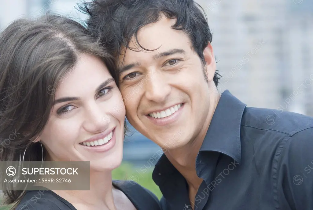Close up of Hispanic couple smiling