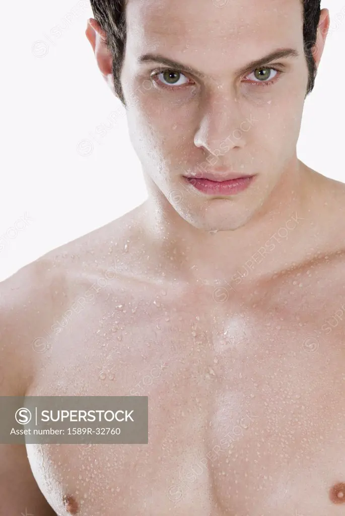 Close up of bare-chested man