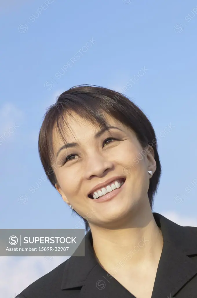 Close up of Asian businesswoman smiling