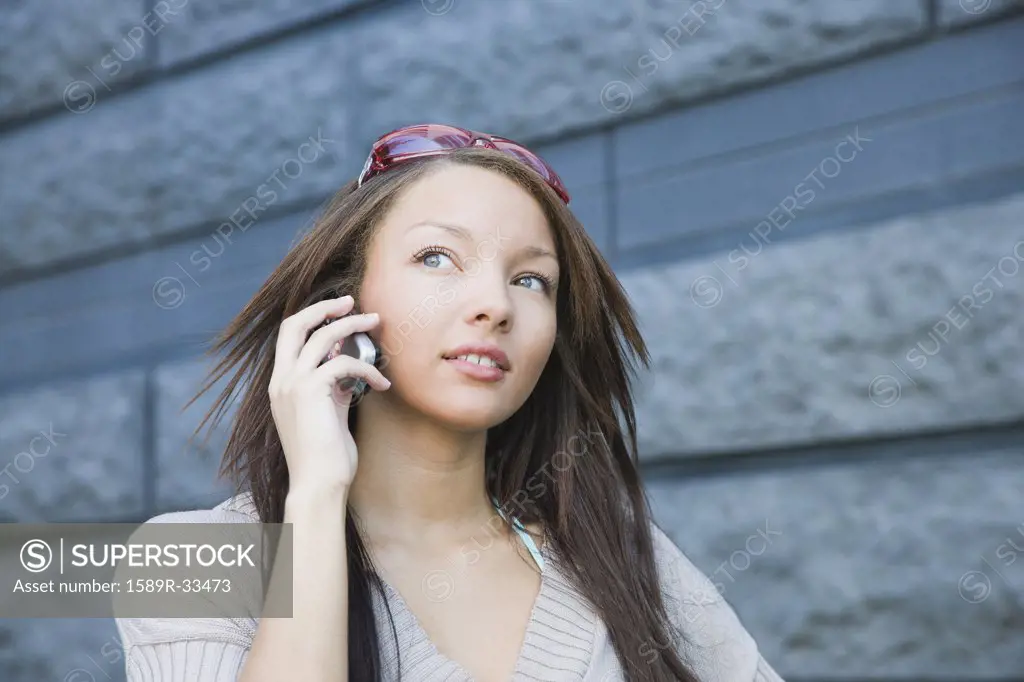 African woman talking on cell phone