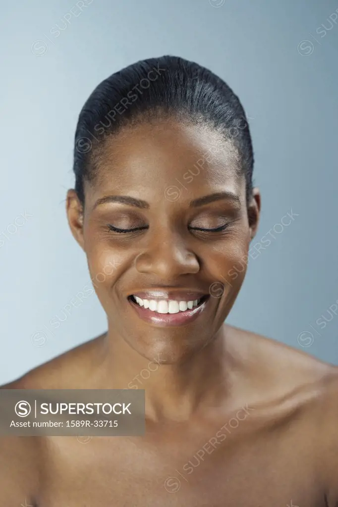 African woman with bare shoulders