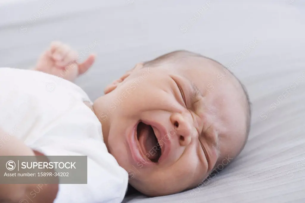 Close up of crying newborn baby
