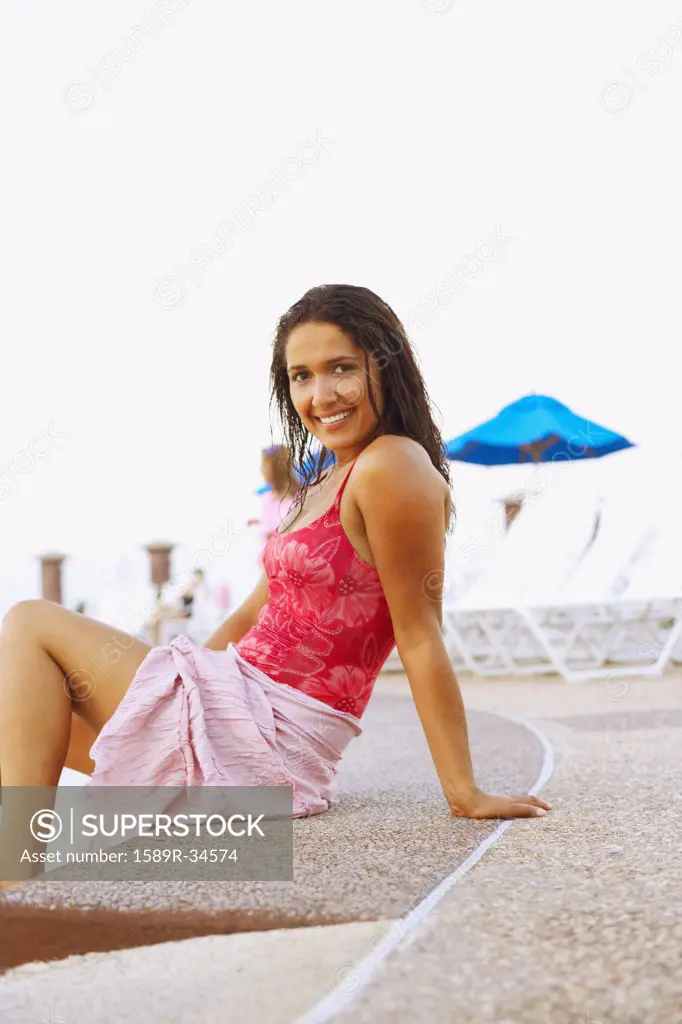 Hispanic woman wearing bathing suit