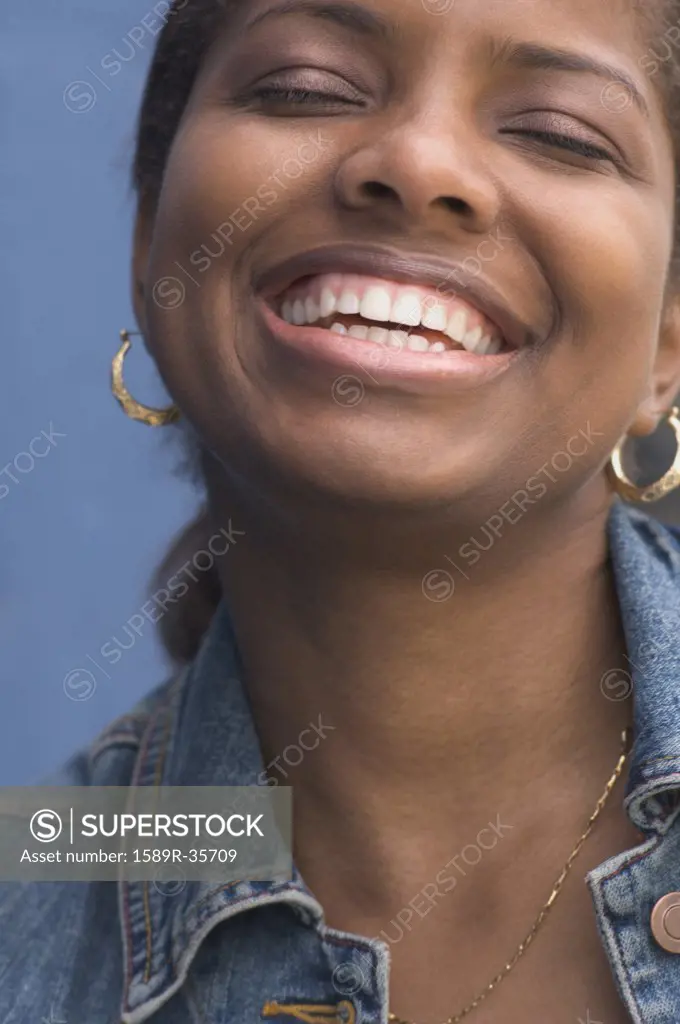 Close up of African woman laughing