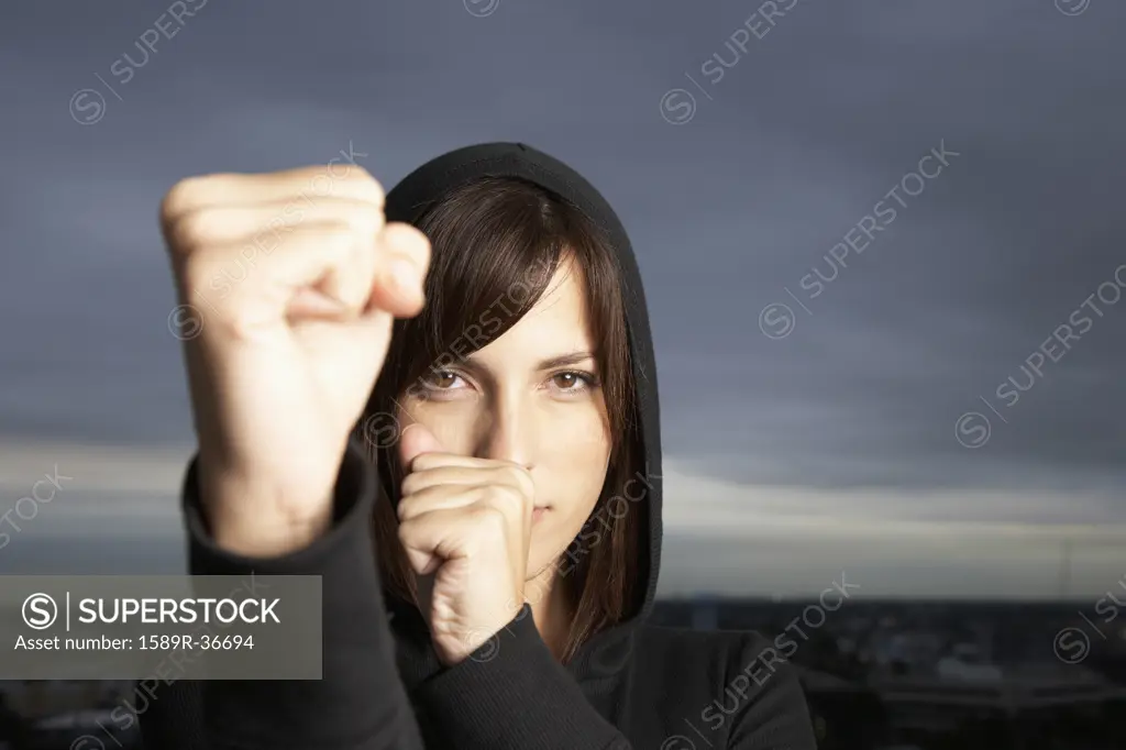 Hispanic woman in fighting stance