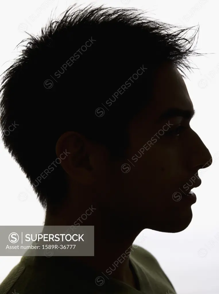 Silhouette profile of Pacific Islander man