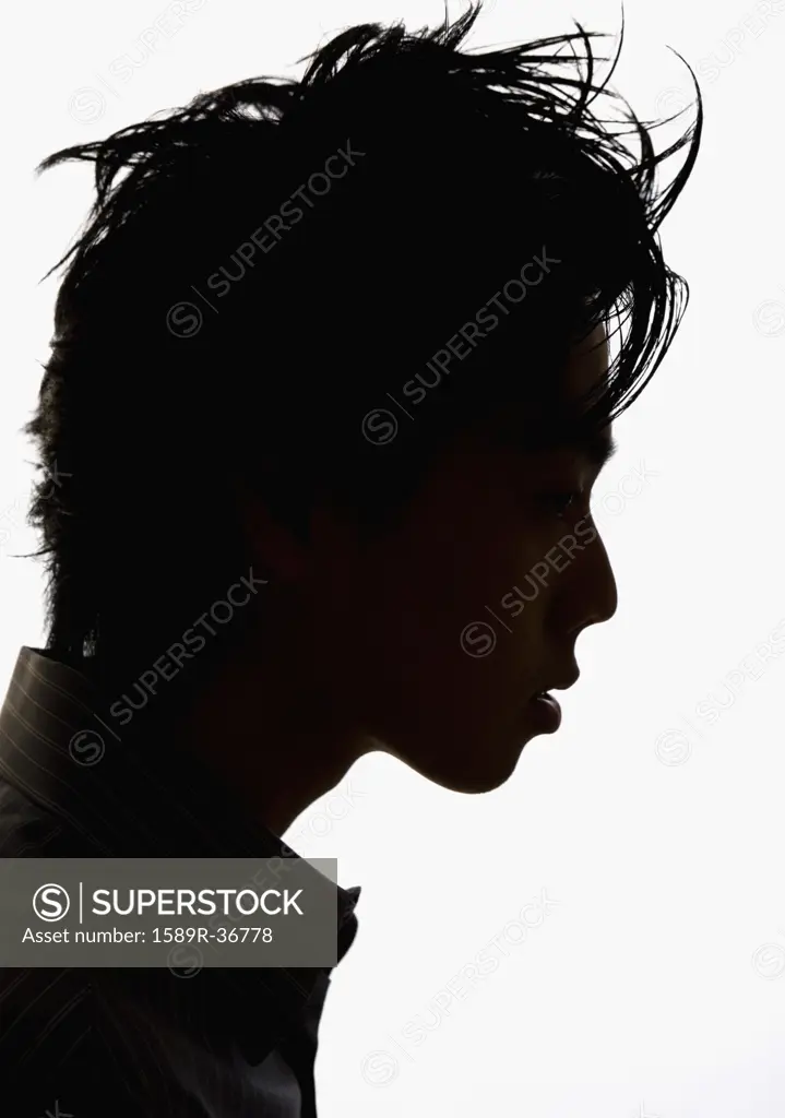 Silhouette profile of Asian man