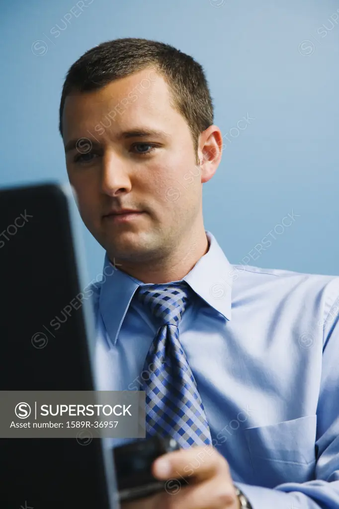 Businessman looking at computer