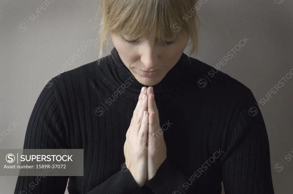 Close up of woman praying
