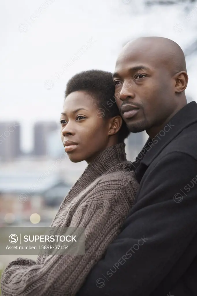 Portrait of African couple hugging