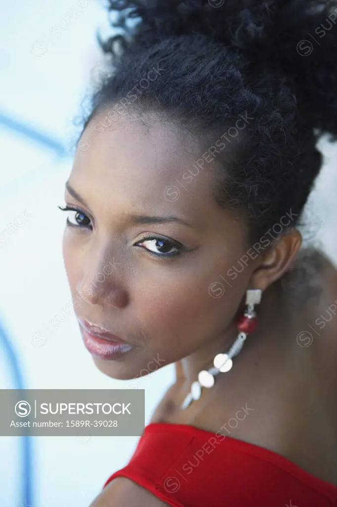 South American woman looking over shoulder