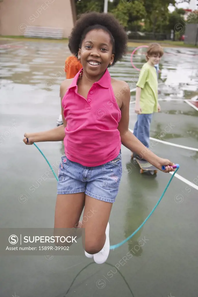 African American girl jumping rope