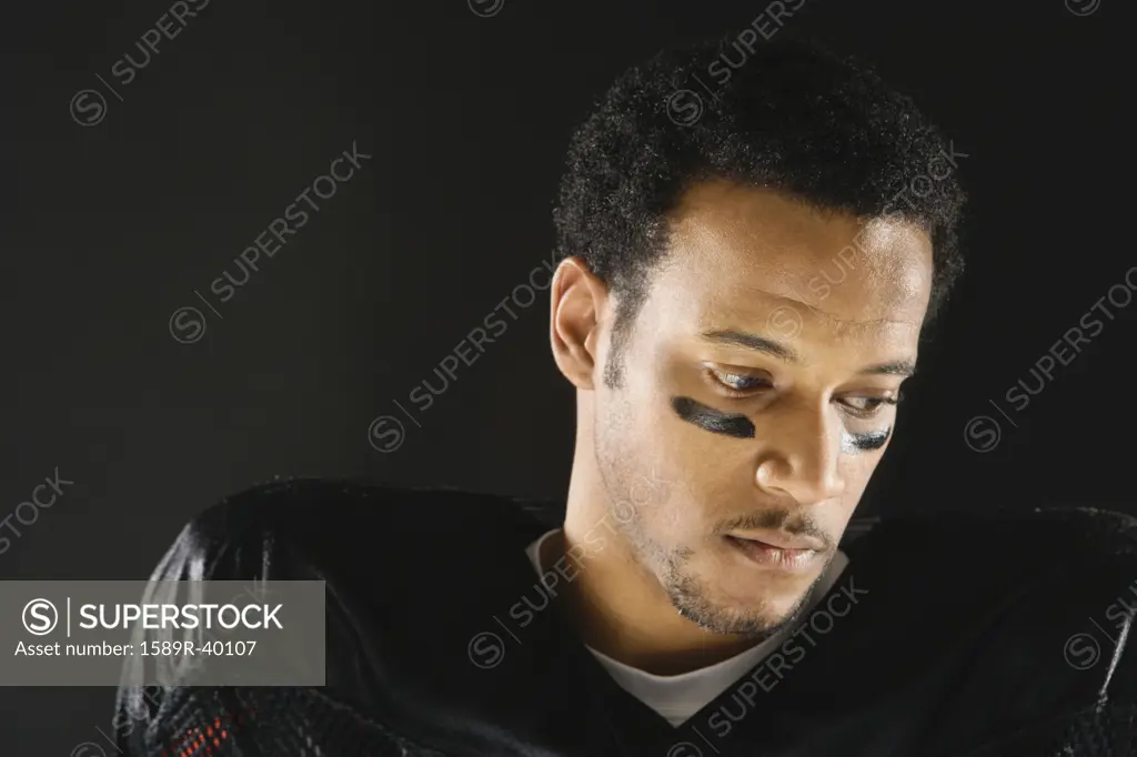 African American man wearing football uniform