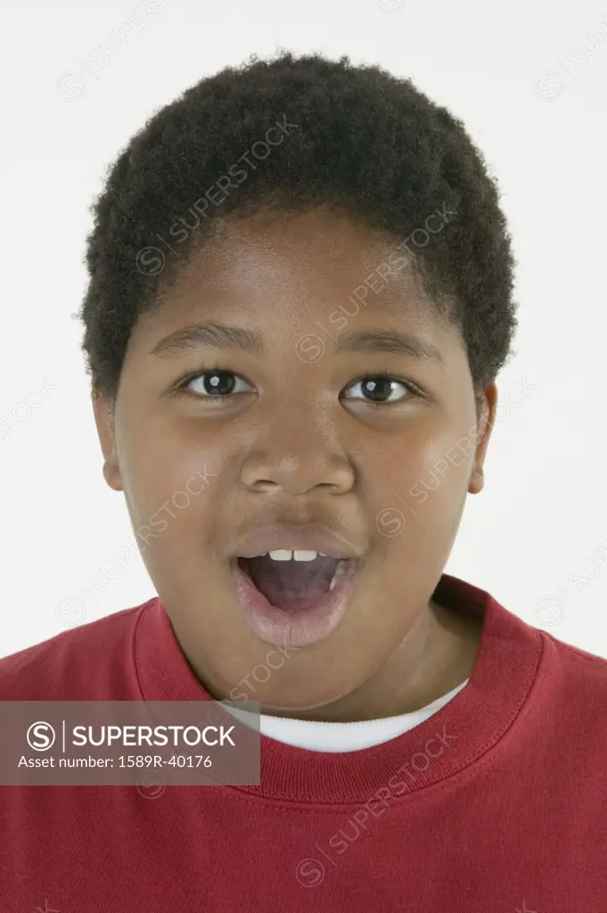 African boy with mouth open