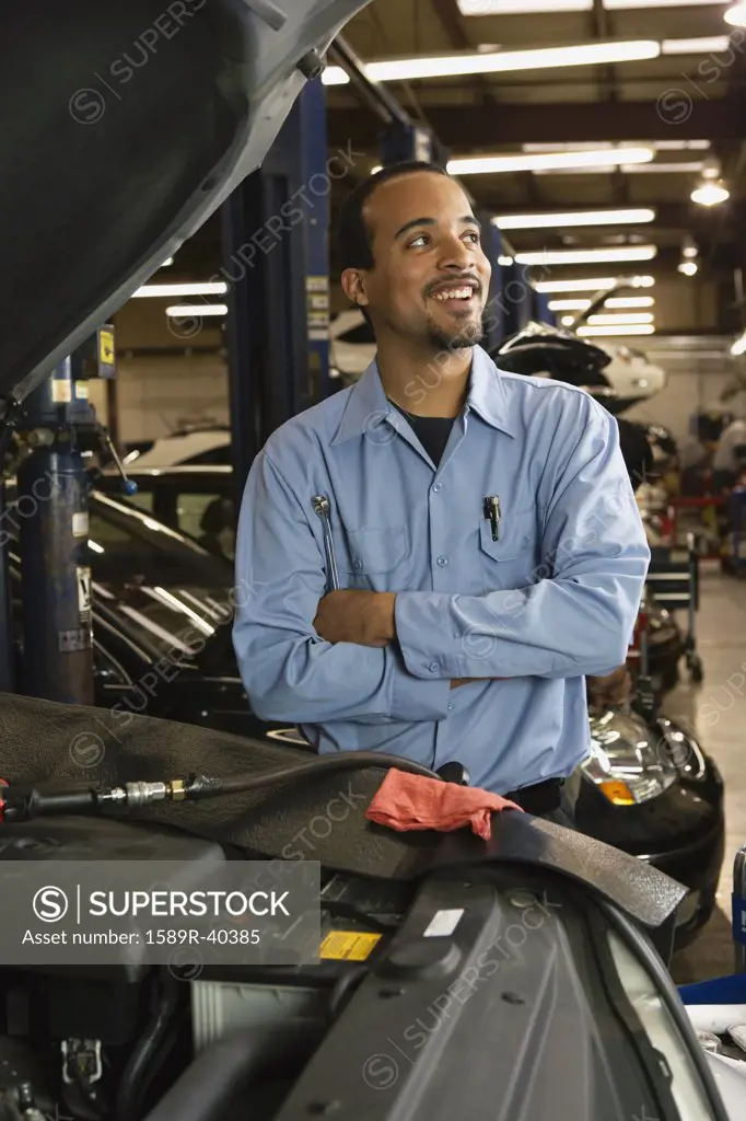 African male auto mechanic in shop