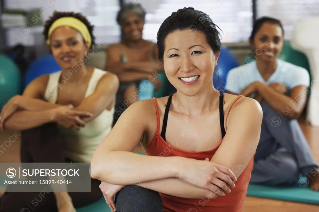 Multi-ethnic women in yoga class