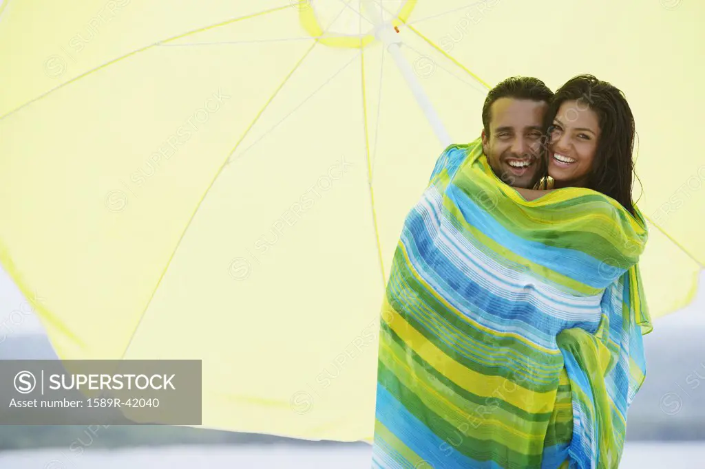 South American couple at beach